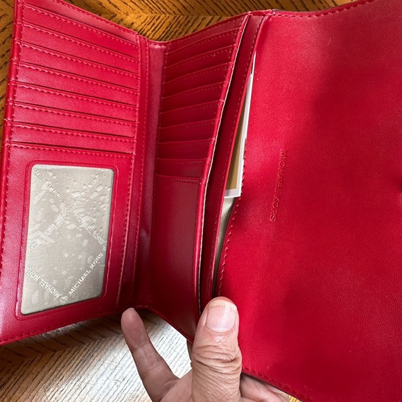 NWT Michael Kors Jet Set Travel
Lg PVC Leather Trifold Wallet (Chili) - Picture 9 of 10